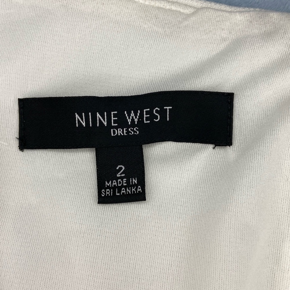 Nine West, size 2, cream and black scoop neck, sleeveless dress.